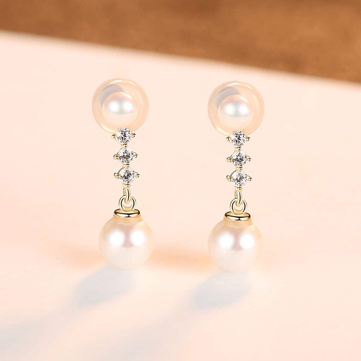 Boucles d'oreilles or-14K-incrustees-de-perles.E14055-demo-04.jpg