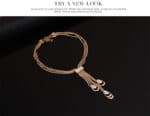 Ensemble-bijoux-boucles-doreilles-colliers-et-bracelet-61154093-4.jpg