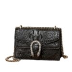 Sac en cuir femme motif crocodile. Petit sac à chaîne Os de Bacchus, noir